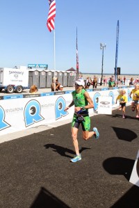 Jeanne, at the finish,  leaving it all out on the run course